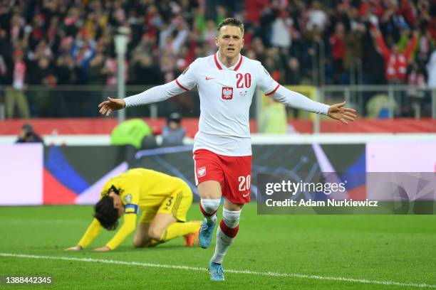 Piotr Zielinski of Poland celebrates after scoring their team's second goal during the 2022 FIFA World Cup Qualifier knockout round play-off match...