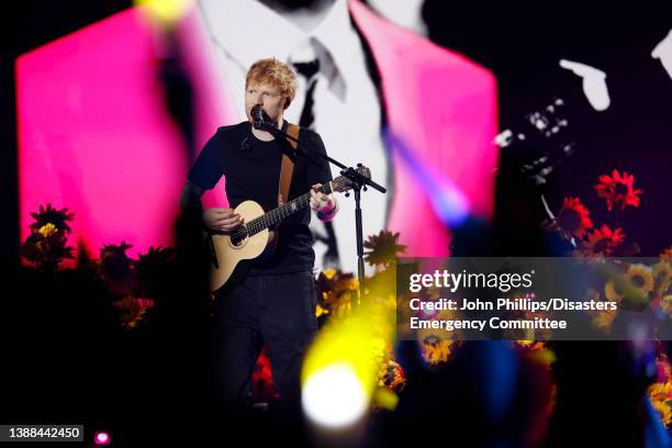 Ed Sheeran performs during a Concert for Ukraine at Resorts World Arena on March 29, 2022 in Birmingham, England. All proceeds from Concert for...