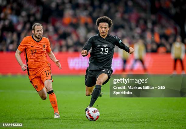 Leroy Sane of Germany in action with Daley Blind of the Netherlands during the international friendly match between Netherlands and Germany at Johan...