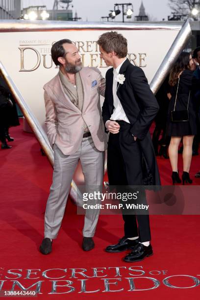 Jude Law and Eddie Redmayne attend the "Fantastic Beasts: The Secrets of Dumbledore" world premiere at The Royal Festival Hall on March 29, 2022 in...