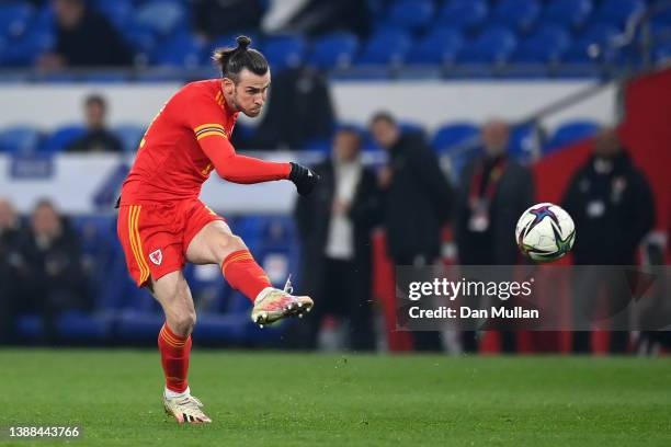 Gareth Bale of Wales scores their team's first goal during the international friendly match between Wales and Czech Republic at Cardiff City Stadium...