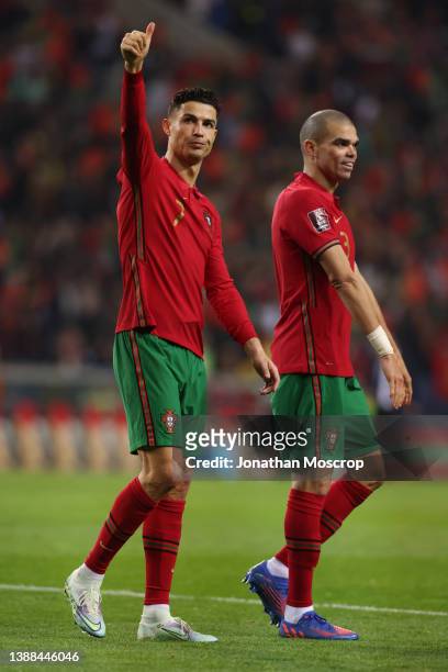Cristiano Ronaldo and Pepe of Portugal acknowledge the fans following the final whistle of the 2022 FIFA World Cup Qualifier knockout round play-off...