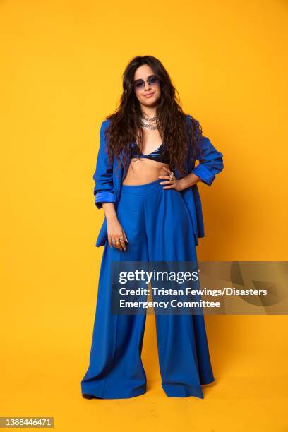 Camila Cabello poses backstage during a Concert for Ukraine at Resorts World Arena on March 29, 2022 in Birmingham, England. All proceeds from...