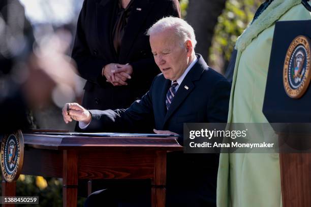 PresidentJoe Biden signs the H.R. 55, the “Emmett Till Antilynching Act” at an event in the Rose Garden of the White House on March 29, 2022 in...