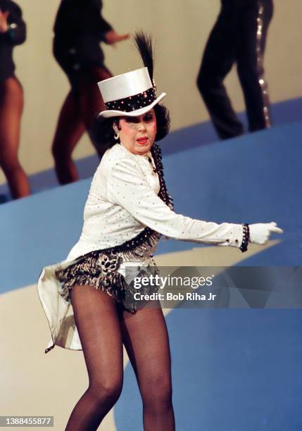 Ann Miller dances during 'Hollywood 100th Birthday' celebration, April 26, 1987 in Hollywood section of Los Angeles, California.