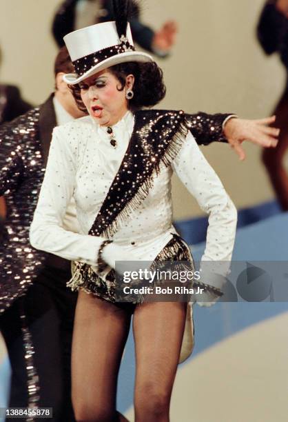 Ann Miller dances during 'Hollywood 100th Birthday' celebration, April 26, 1987 in Hollywood section of Los Angeles, California.