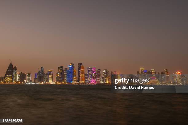 View of the skyline of Doha at sunset on March 29, 2022 in Doha, Qatar.