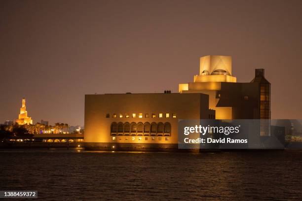 View of the Museum of Islamic Art at sunset on March 29, 2022 in Doha, Qatar.