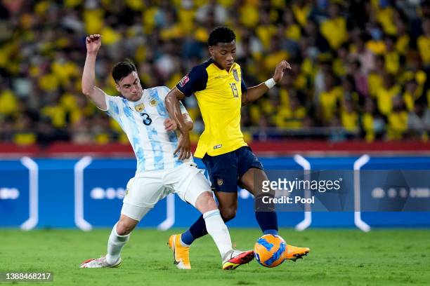 Nicolas Tagliafico of Argentina fights for the ball with Gonzalo Plata of Ecuador during the FIFA World Cup Qatar 2022 qualification match between...