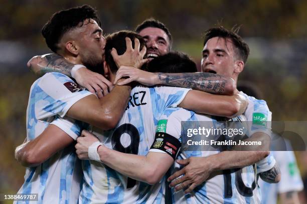 Julián Álvarez of Argentina celebrates with teammates after scoring his team's first goal during the FIFA World Cup Qatar 2022 qualification match...