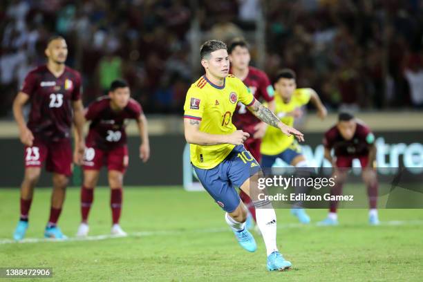 James Rodríguez of Colombia celebrates after scoring his team's first goal during the FIFA World Cup Qatar 2022 qualification match between Venezuela...