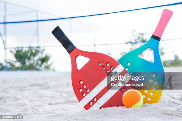 beach tennis racket and balls - racquet stock pictures, royalty-free photos & images