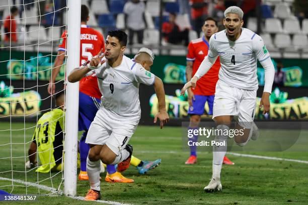 Luis Suarez of Uruguay celebrates after scoring the first goal of his team during the FIFA World Cup Qatar 2022 qualification match between Chile and...