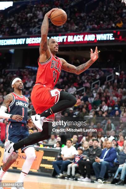 DeMar DeRozan of the Chicago Bulls drives to the basket in the fourth quarter during a NBA basketball game against the Washington Wizards at Capital...