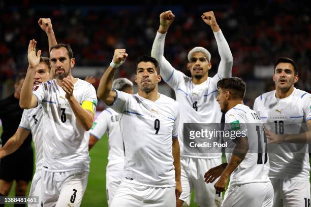 Luis Suarez of Uruguay celebrates with teammates after scoring the first goal of his team during the FIFA World Cup Qatar 2022 qualification match...