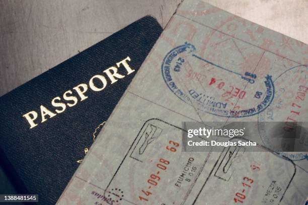 travelers passport documents - passport stock pictures, royalty-free photos & images