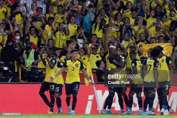 Enner Valencia of Ecuador celebrates with teammates after scoring his team's first goal during the FIFA World Cup Qatar 2022 qualification match...