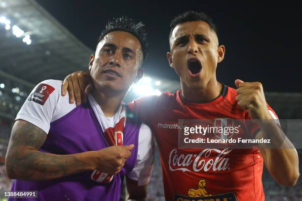 Christian Cueva and Yoshimar Yotún of Peru celebrate after winning the FIFA World Cup Qatar 2022 qualification match between Peru and Paraguay at...