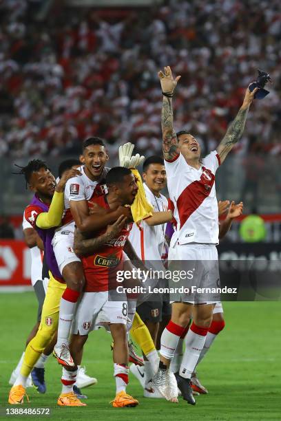 Gianluca Lapadula of Peru celebrates with teammates after winning the FIFA World Cup Qatar 2022 qualification match between Peru and Paraguay at...