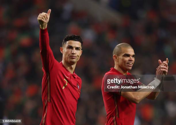Cristiano Ronaldo and Pepe of Portugal applaud the fans following the final whistle of the 2022 FIFA World Cup Qualifier knockout round play-off...