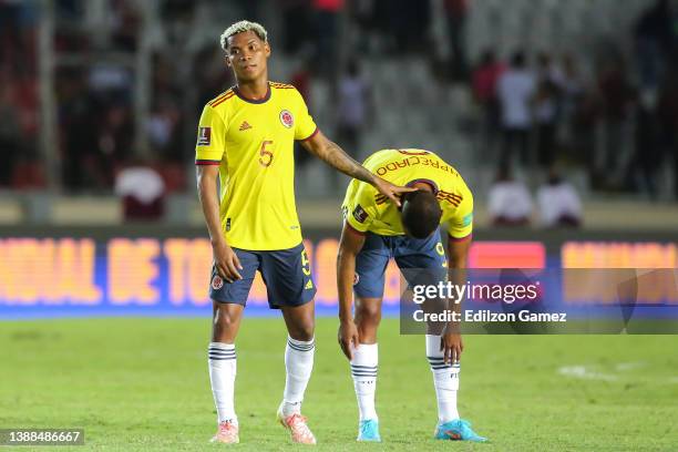 Harold Preciado and Wilmar Barrios of Colombia look dejected after the FIFA World Cup Qatar 2022 qualification match between Venezuela and Colombia...