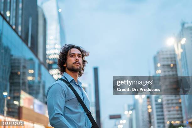 businessman waiting for app car - paulista avenue sao paulo stock pictures, royalty-free photos & images