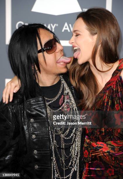 Musician Sin Quirin of Ministry and guest arrive at the 54th Annual GRAMMY Awards held at Staples Center on February 12, 2012 in Los Angeles,...