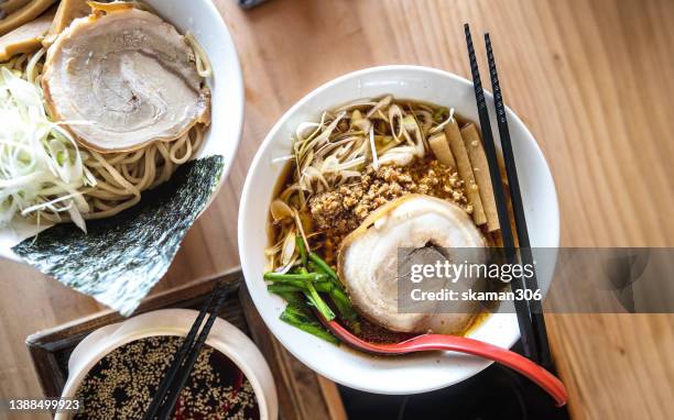 topview of osaka ramen noodle  style with chili soup and tsukemen noodle  japanese style - カレーうどん ストックフォトと画像