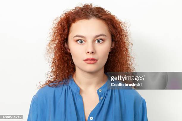 studio portrait of an attractive 20 year old red haired woman - year long stock pictures, royalty-free photos & images