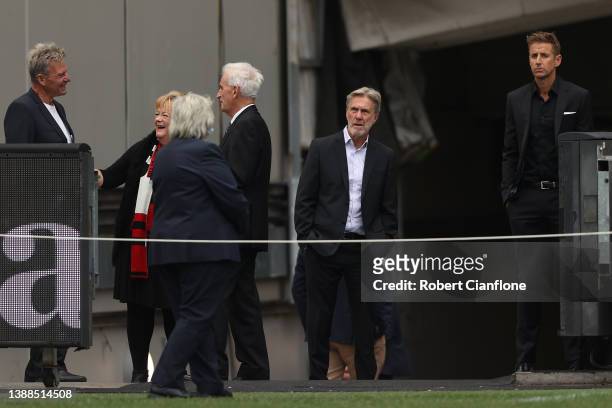 Former AFL player Sam Newman, Glenn Robbins and Mark Howard attend the state memorial service for former Australian cricketer Shane Warne at the...