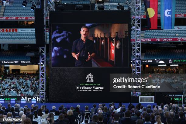 Actor Eric Bana is seen on the big screen during the state memorial service for former Australian cricketer Shane Warne at the Melbourne Cricket...