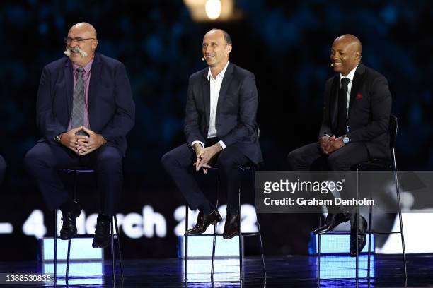 Merv Hughes, Nasser Hussain and Brian Lara laugh on stage during the state memorial service for former Australian cricketer Shane Warne at the...