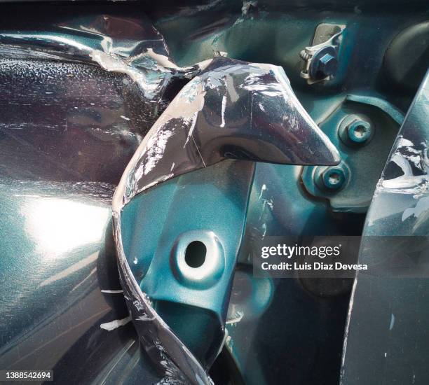 detail crumpled car  and damaged in car accident. - carrosserie stockfoto's en -beelden