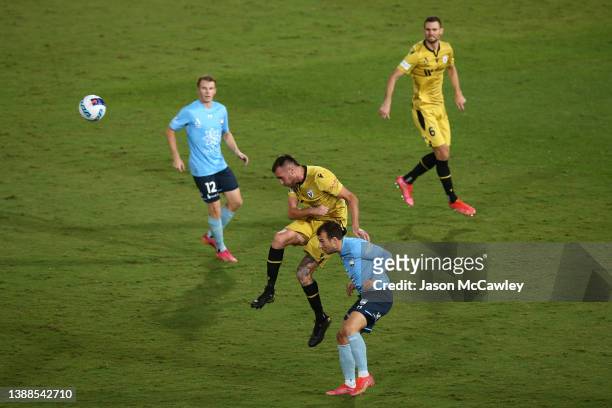 Aleksandar Susnjar of the Bulls and Adam Le Fondre of Sydney FC compete for the ball during the A-League Mens match between Sydney FC and Macarthur...