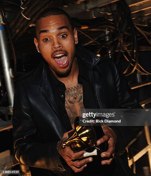 Singer Chris Brown poses with his award for Best R&B Album during The 54th Annual GRAMMY Awards at Staples Center on February 12, 2012 in Los...