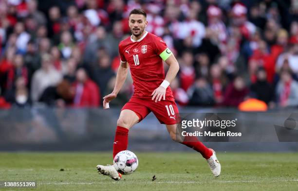 Dušan Tadićof Serbia controls the ball during the international friendly match between Denmark and Serbia at Parken Stadium on March 29, 2022 in...