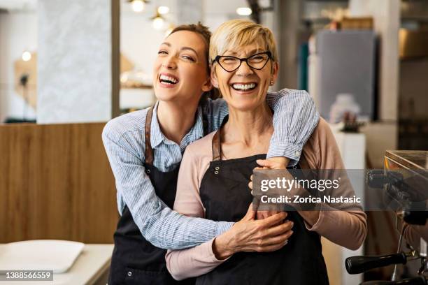 coffee shop family business - happy restaurant waitress stock pictures, royalty-free photos & images