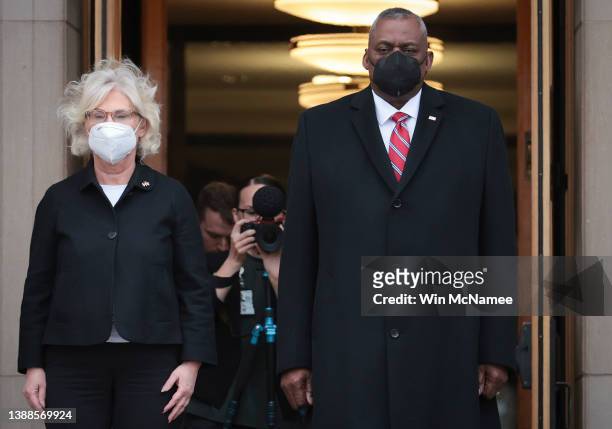 Secretary of Defense Lloyd Austin welcomes German Defense Minister Christine Lambrecht to the Pentagon during an enhanced honor cordon ceremony March...