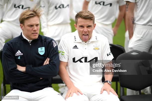 Matthew Dunn and Sam Curran of Surrey share a joke during the Surrey CCC Photocall at The Kia Oval on March 30, 2022 in London, England.