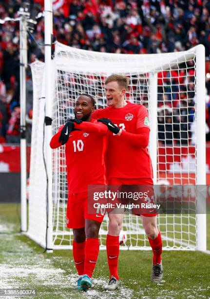 Junior Hoilett of Canada celebrates a goal with Scott Kennedy during a 2022 World Cup Qualifying match against Jamaica at BMO Field on March 27, 2022...