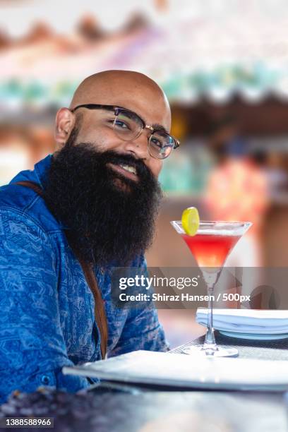 bejo,man drinking cocktail in bar,panaji,goa,india - goa nightlife stock pictures, royalty-free photos & images