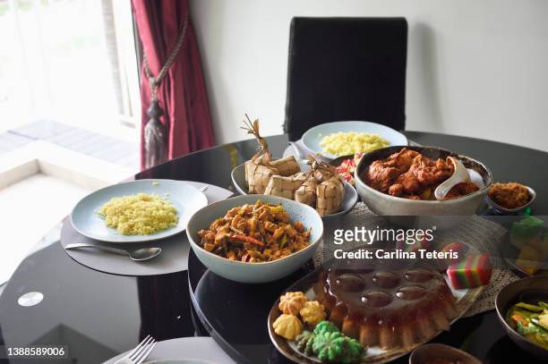 dining table set with food for hari raya - traditional malay food stock pictures, royalty-free photos & images