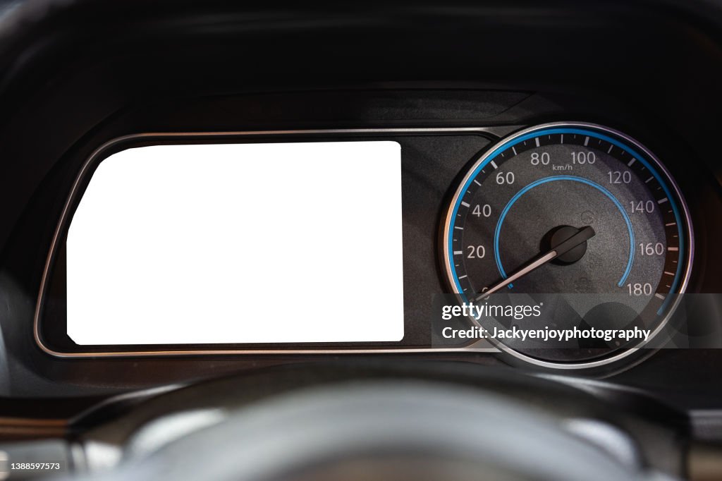 A digital display screen on the dashboard of a modern car, from an vehicle interior point of view