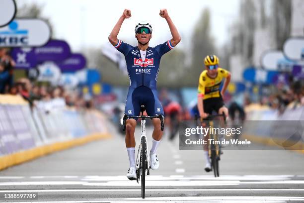 Mathieu Van Der Poel of Netherlands and Team Alpecin-Fenix celebrates at finish line as race winner during the 76th Dwars Door Vlaanderen 2022 -...