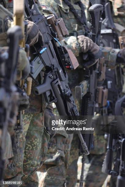 Soldiers of the Bundeswehr's Panzerbrigade 21 tank brigade, equipped with machine guns MG5 with Hensoldt Optics, G3 and others are seen during a...