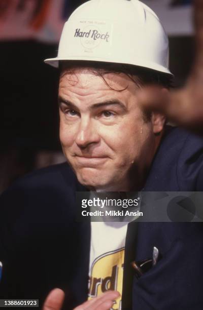 Close-up of Canadian actor and comedian Dan Aykroyd, in a hard hat, at an event celebrating the construction of a Hard Rock Cafe on Clarendon Street...