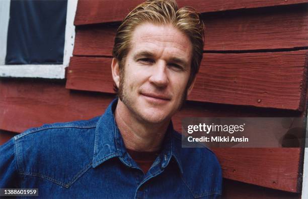 Portrait of American actor Matthew Modine as he poses outside a barn , Claverack, New York, 1993.