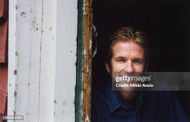 Portrait of American actor Matthew Modine as he poses outside a barn , Claverack, New York, 1993.