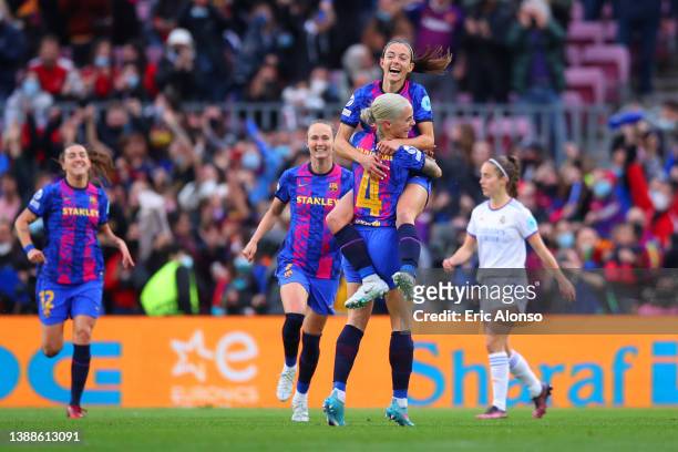 Maria Leon of FC Barcelona celebrates with teammate Aitana Bonmati after scoring their team's first goal during the UEFA Women's Champions League...