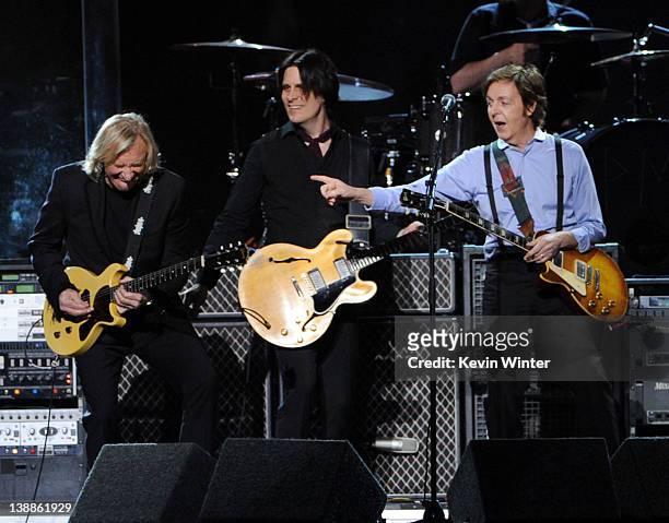 Musicians Joe Walsh, Rusty Anderson and Paul McCartney perform onstage at the 54th Annual GRAMMY Awards held at Staples Center on February 12, 2012...
